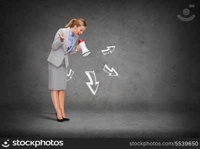 business, communication and office concept - angry businesswoman with megaphone screaming at someone imaginary