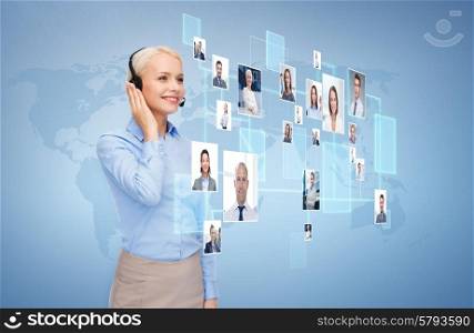 business, communication, cooperation and people concept - happy female helpline operator with headset over blue background and icons of contacts or customers