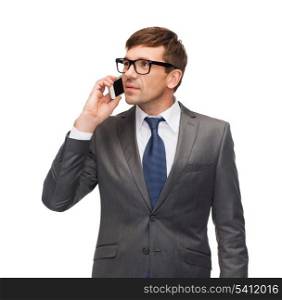 business, communication, modern technology and office concept - buisnessman with cell phone