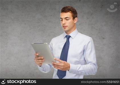 business, communication, modern technology and office concept - businessman with tablet pc