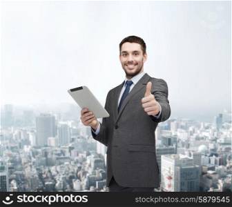 business, communication, modern technology and office concept - smiling buisnessman with tablet pc computer showing thumbs up