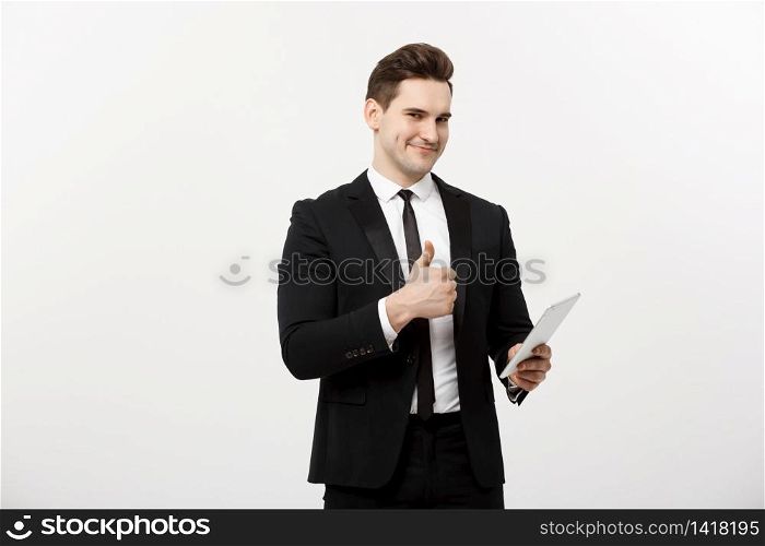 business, communication, modern technology and office concept - smiling buisnessman with tablet computer showing thumbs up. Isolated over white background.. business, communication, modern technology and office concept - smiling buisnessman with tablet computer showing thumbs up. Isolated over white background