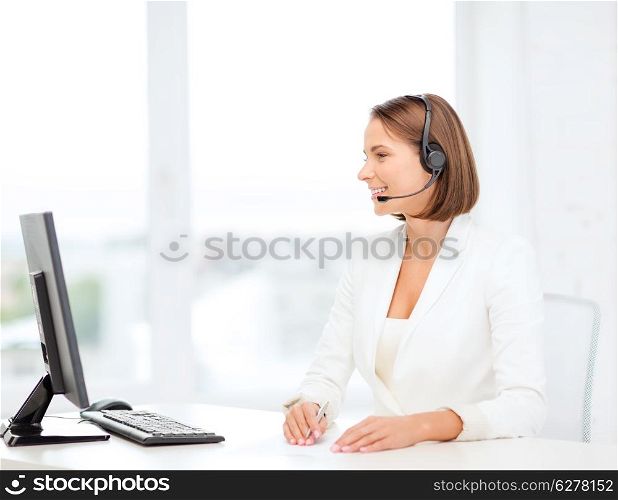 business, communication, technology and call center concept - friendly female helpline operator with headphones and computer call center