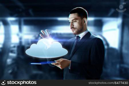 business, computing and future technology concept - businessman in suit working with transparent tablet pc computer and hologram of cloud over abstract background. businessman with transparent tablet and cloud. businessman with transparent tablet and cloud