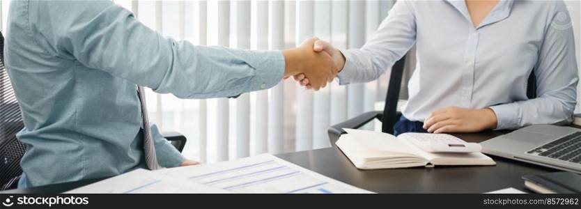 Business concept, Business colleagues shaking hands together after working successfully.