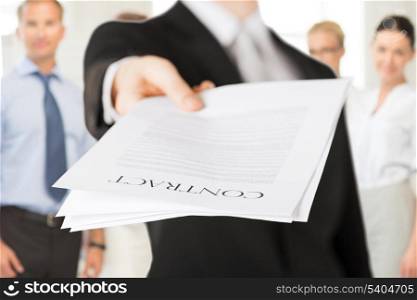business concept - businessman with contract