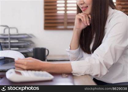 Business concept, Businesswoman reading business document to analysis investment budget of project.