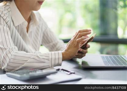Business concept, Businesswoman use phone to research data and working about new business project.