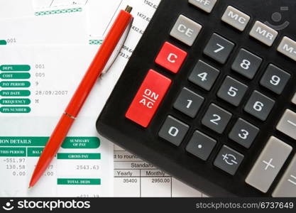 Business concept. calculator,pen and the financial reports.