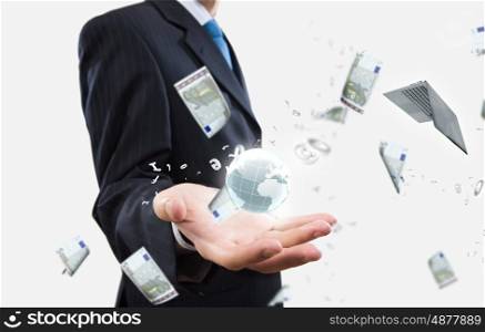Business concept. Close up of businessman holding business items in palm