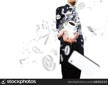 Business concept. Close up of businessman holding business items in palm