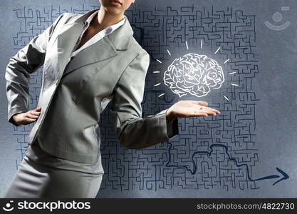 Business concept. Close up of businesswoman with sketches at background