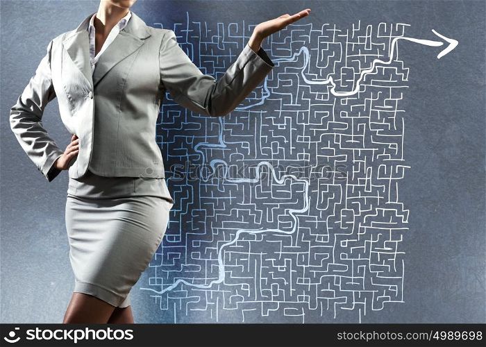 Business concept. Close up of businesswoman with sketches at background