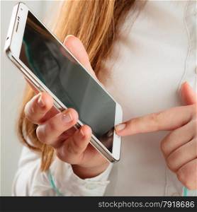 Business concept. Closeup woman holding in hands mobile phone, girl using smartphone