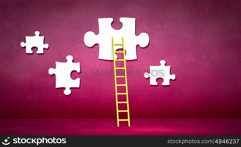 Business concept. Conceptual image of ladder leading to puzzle element