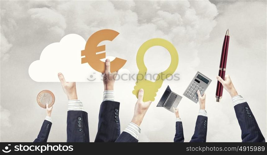 Business concept. Group of business people holding business signs in raised hands
