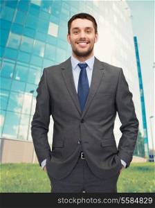 business concept - handsome businessman in suit