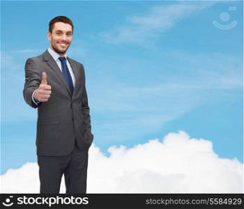 business concept - handsome businessman showing thumbs up