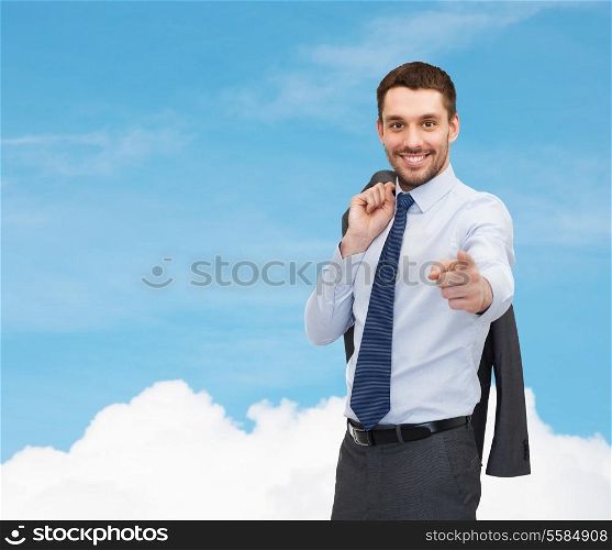 business concept - handsome businessman with jacket over shoulder