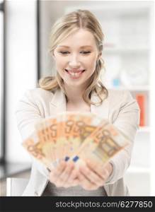 business concept - lovely woman with euro cash money