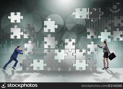 Business concept of teamwork with puzzle pieces