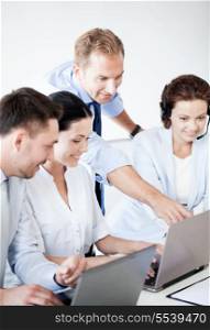 business concept - picture of group of people working in call center or office