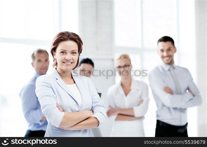 business concept - picture of smiling attractive businesswoman in office