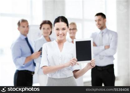 business concept - picture of smiling businesswoman with tablet pc in office
