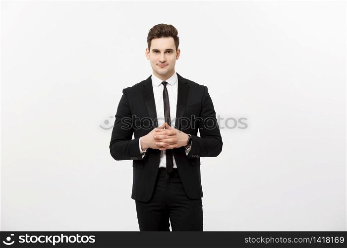 Business Concept - Portrait Handsome Business man holding hands with confident face. White Background.. Business Concept - Portrait Handsome Business man in suit holding hands with confident face. White Background.