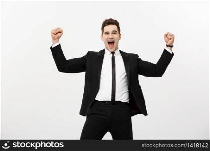Business Concept: Portrait handsome businessman expressing surprise and joy raising his hands, isolated over white background. Business Concept: Portrait handsome businessman expressing surprise and joy raising his hands, isolated over white background.