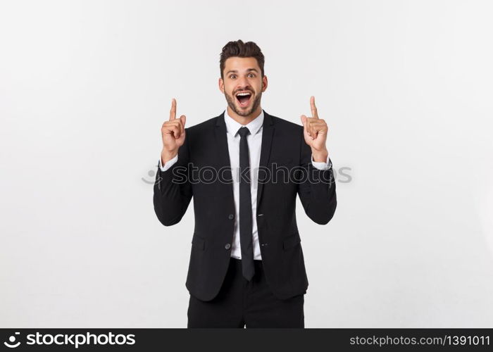 Business Concept: Portrait handsome young businessman point finger on side to empty copy space. Isolated over white background.. Business Concept: Portrait handsome young businessman point finger on side to empty copy space. Isolated over white background