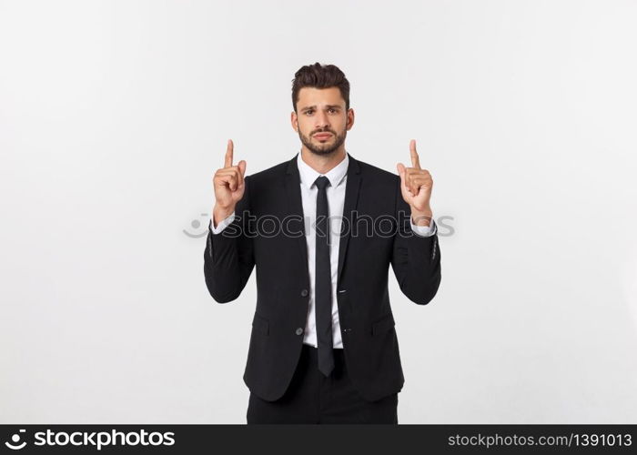 Business Concept: Portrait handsome young businessman point finger on side to empty copy space. Isolated over white background.. Business Concept: Portrait handsome young businessman point finger on side to empty copy space. Isolated over white background