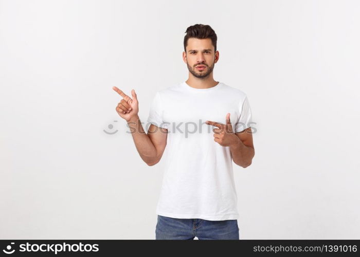 Business Concept: Portrait handsome young businessman point finger on side to empty copy space. Isolated over white background.. Business Concept: Portrait handsome young businessman point finger on side to empty copy space. Isolated over white background