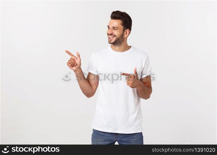 Business Concept: Portrait handsome young businessman point finger on side to empty copy space. Isolated over white background.. Business Concept: Portrait handsome young businessman point finger on side to empty copy space. Isolated over white background