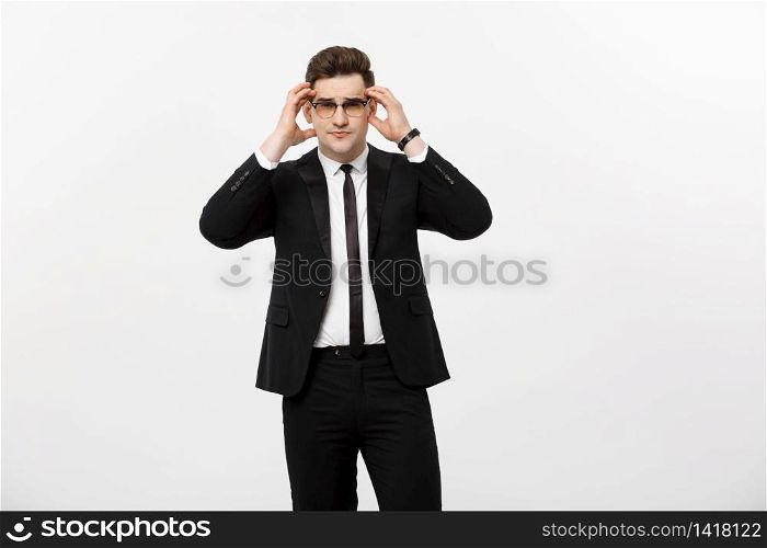 Business Concept: Portrait handsome young businessman wearing glasses isolated over white background.. Business Concept: Portrait handsome young businessman wearing glasses isolated over white background