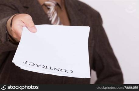 Business concept signing contract. Businessman giving blank empty paper sheet with sign contract and space for text.