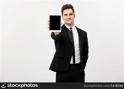 Business Concept: Smiling handsome businessman presenting website or presentation on tablet. Business Concept: Smiling handsome businessman presenting website or presentation on tablet.