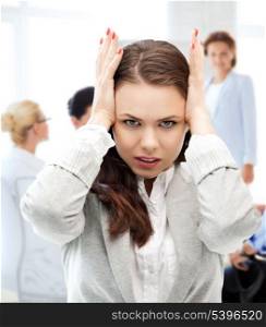 business concept - stressed businesswoman on meeting in office