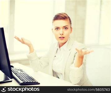 business concept - stressed businesswoman with computer in office