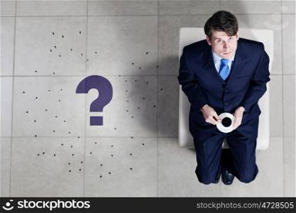 Business concept. Top view of businessman sitting on chair
