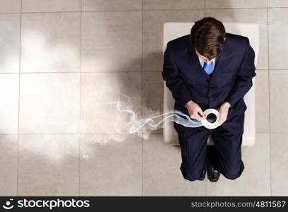 Business concept. Top view of businessman sitting on chair