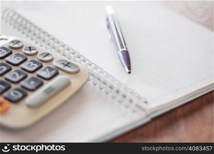 Business concept with calculator, pen and notebook, stock photo