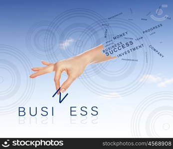 Business concept with hands and business words made up from letters