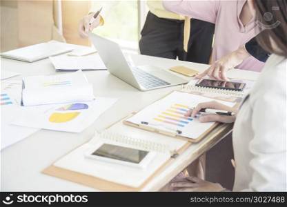 Business conference concept. Business people meeting and brainst. Business conference concept. Business people meeting and brainstorm about new project with laptop and information graph in office. Picture for add text message. Backdrop for design art work.