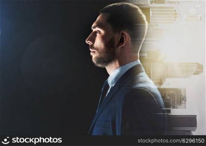 business, corporate and people concept - businessman in suit over city buildings background. businessman over city buildings