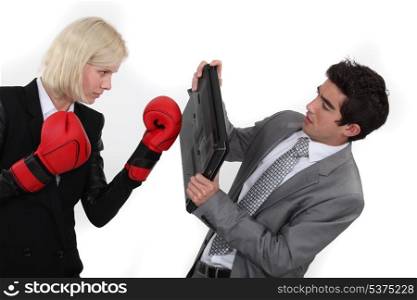 Business couple fighting