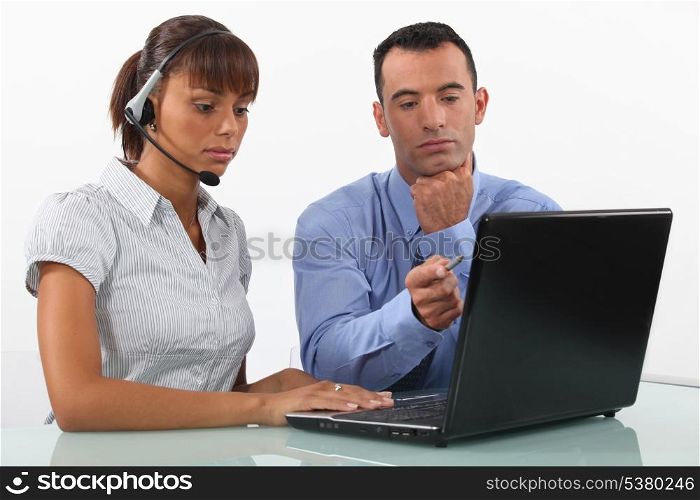 Business couple with a laptop