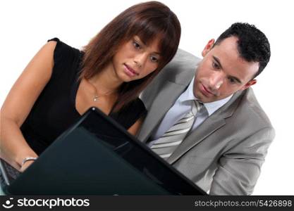 Business couple with laptop