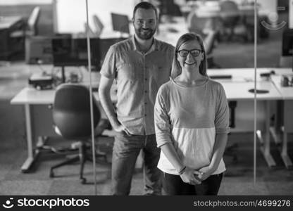 business couple working together on project at modern startup office