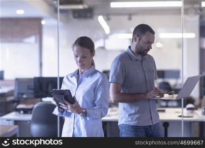 business couple working together on project at modern startup office